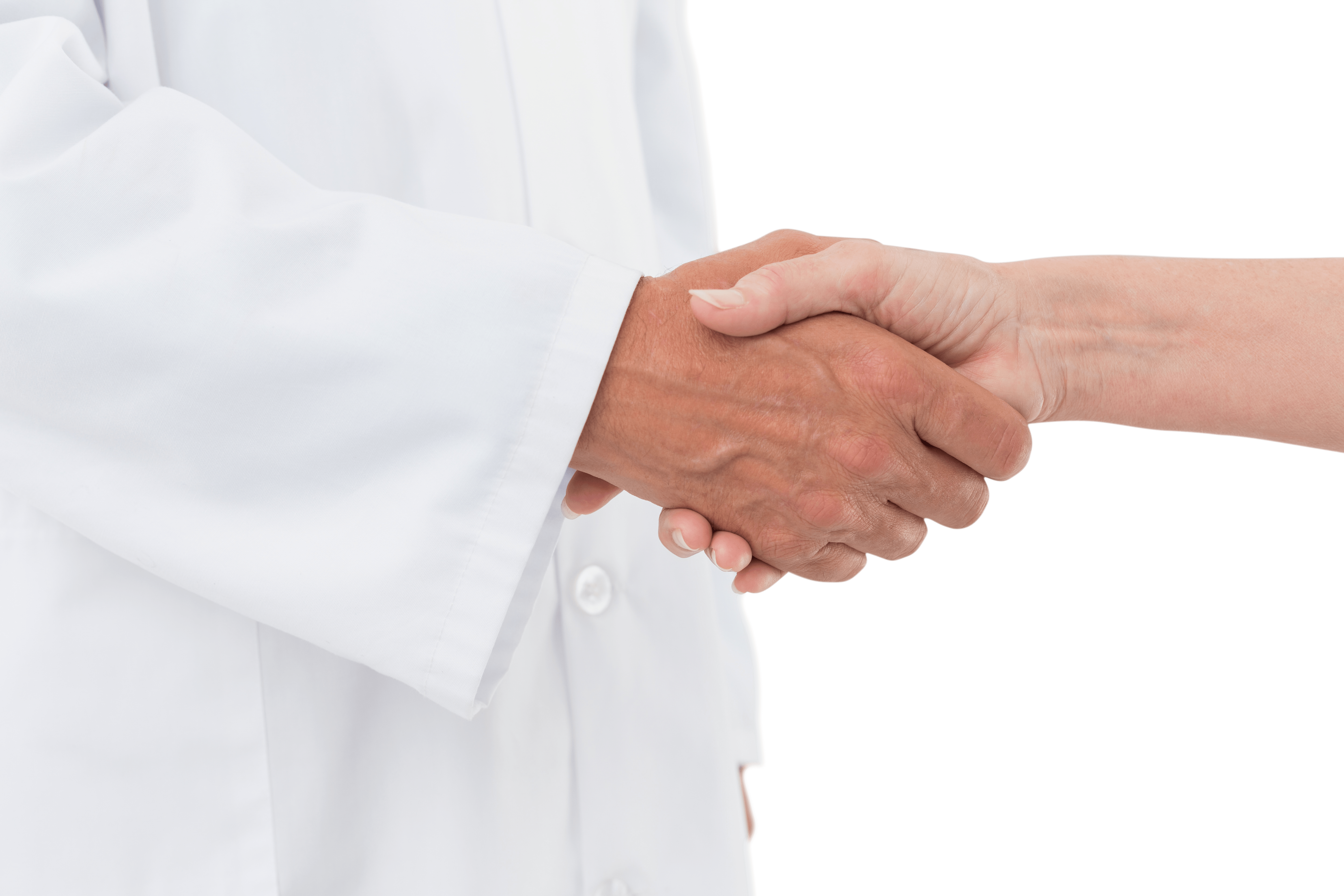 Handshake between physician wearing a white lab coat and patient