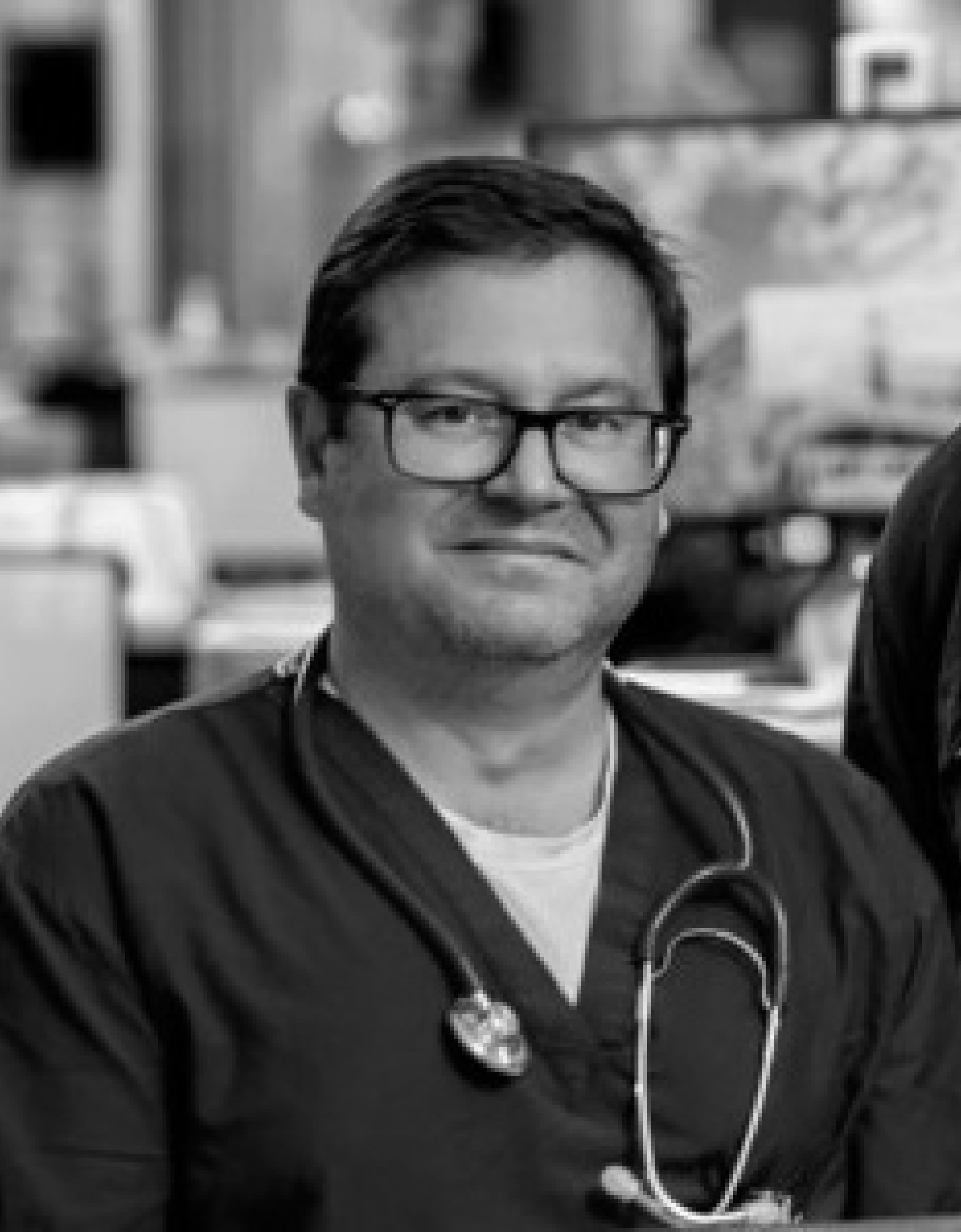 Black and white headshot of Dr. Giulio DiDiodato